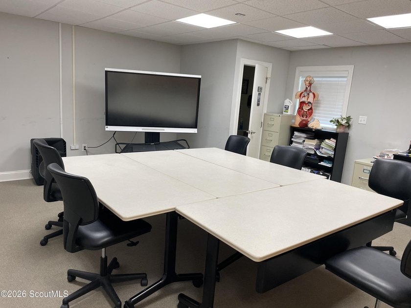 This approximately 2,950 SF commercial office is one block off - photo 8