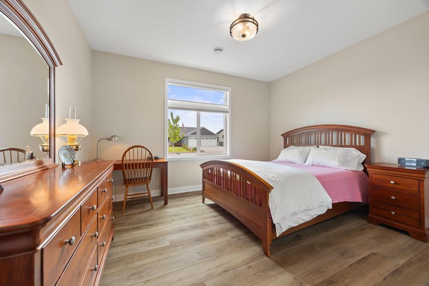 Enjoy the ease of one-level living in this beautifully designed - photo 11