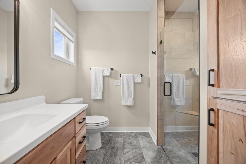 Enjoy the ease of one-level living in this beautifully designed - photo 16