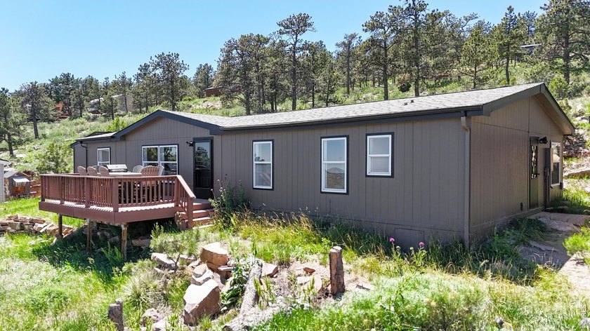 Escape to the tranquility of Carter Lake living. This property - photo 2