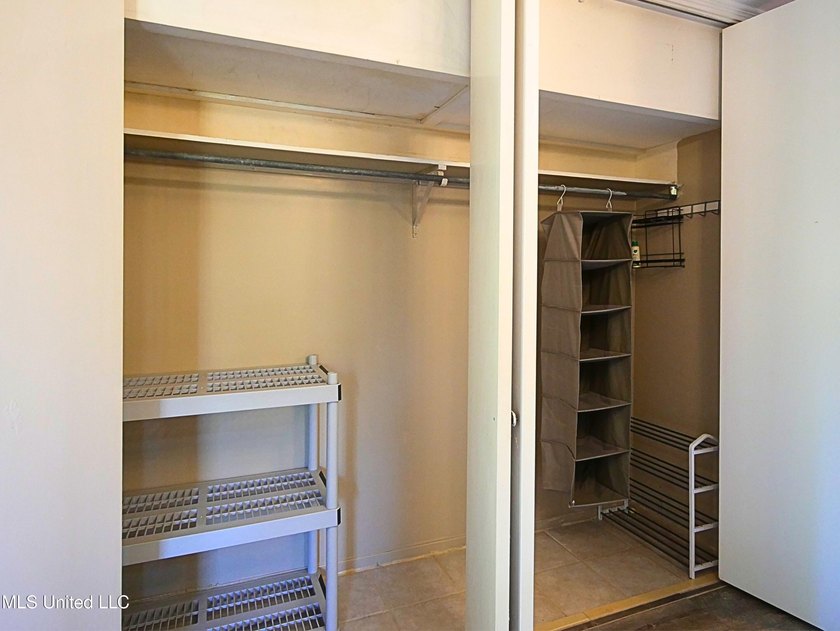 This move-in-ready condominium is ideally located in a desirable - photo 11
