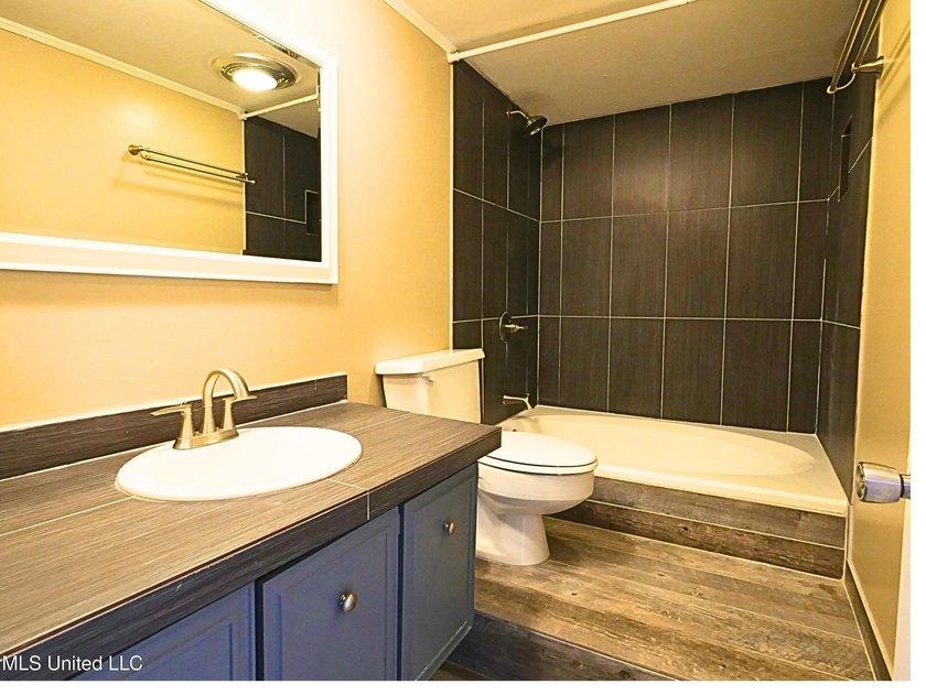 This move-in-ready condominium is ideally located in a desirable - photo 13