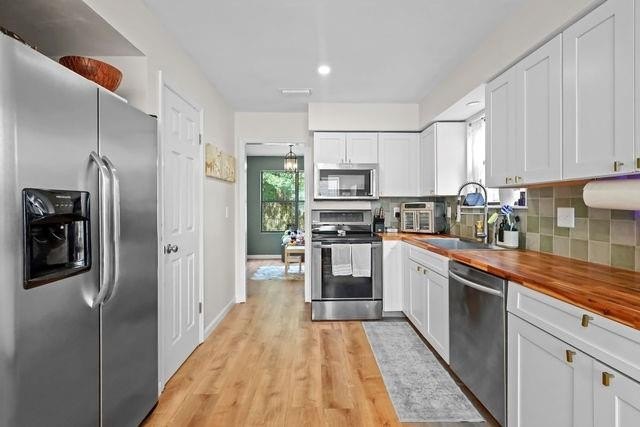 Beautifully updated and competitively priced in the highly - photo 8