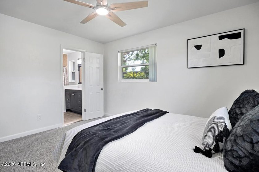Welcome home to this inviting 3-bedroom, 2-bath pool home - photo 11