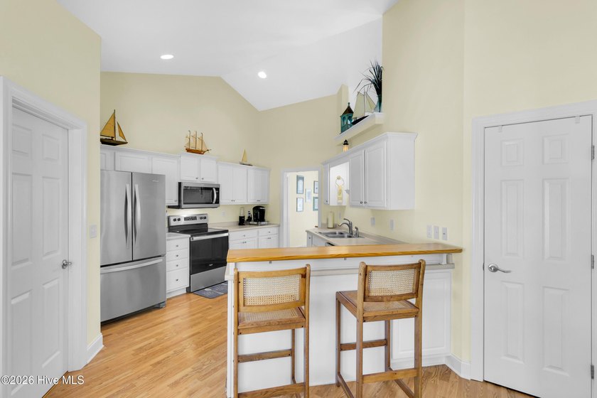Light-filled, airy, and designed for easy coastal living, this - photo 10