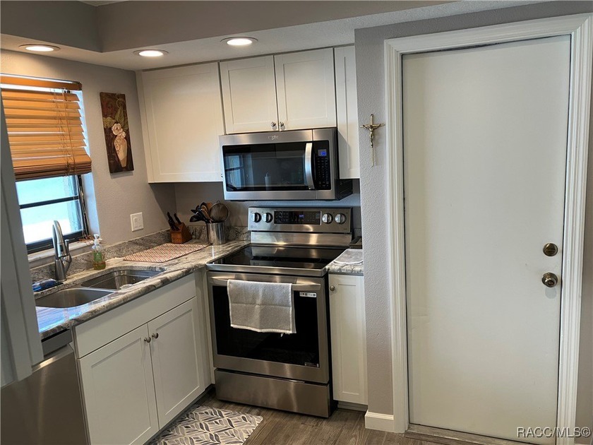 $7,500 NEW PRICE REDUCTION! Beautiful VILLA on the CANAL with - photo 12