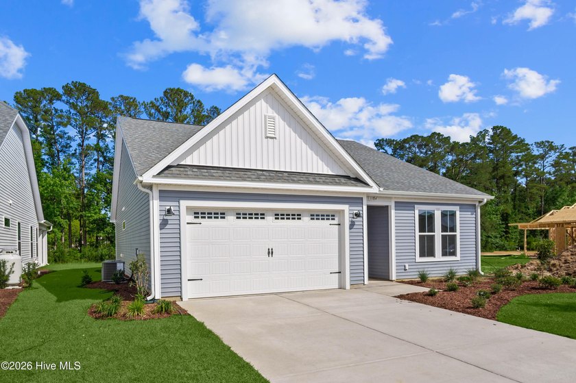The Cherry Grove model offers a spacious and inviting retreat - photo 3