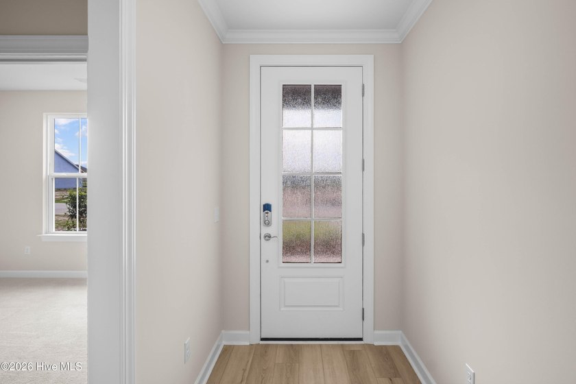 The Cherry Grove model offers a spacious and inviting retreat - photo 4