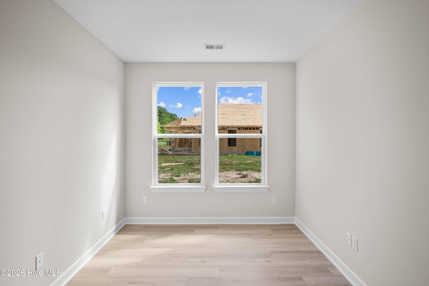 The Cherry Grove model offers a spacious and inviting retreat - photo 10