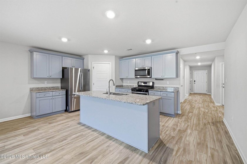 Gorgeous brick home, built in 2022 and located in the highly - photo 11
