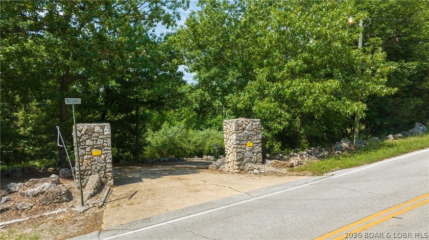 Pass through the gated entrance of Triple K Ranch &amp; experience - photo 12