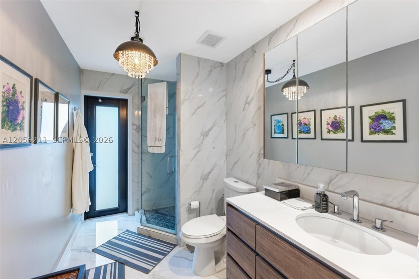 Discover elevated Miami living in this beautifully updated - photo 12