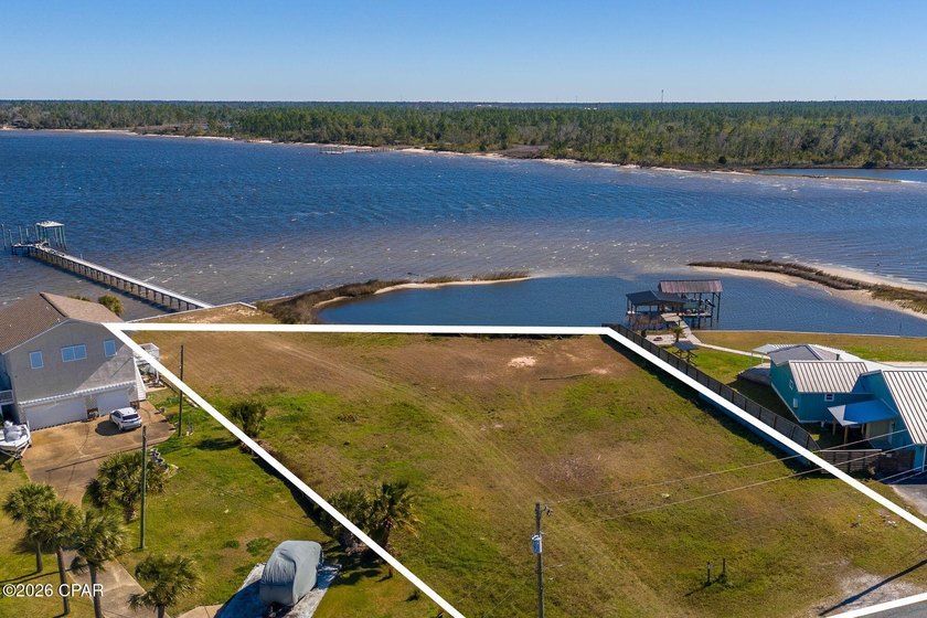 A rare stretch of North Bay shoreline sets the stage for - photo 13