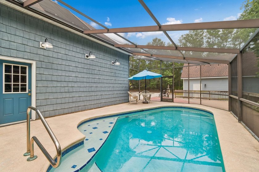Tucked away on over 2 acres with no HOA, this Saint Augustine - photo 3