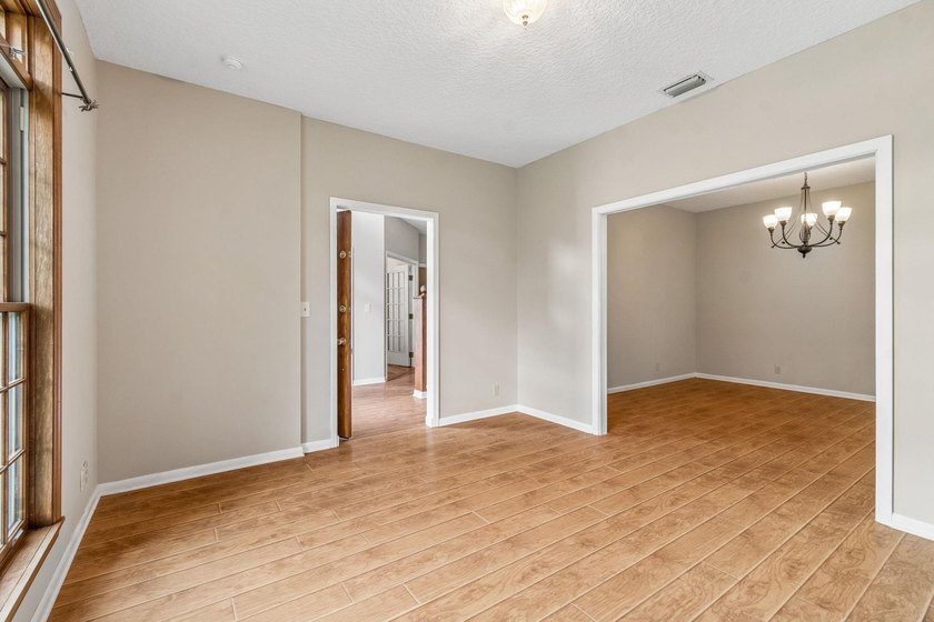 Tucked away on over 2 acres with no HOA, this Saint Augustine - photo 8