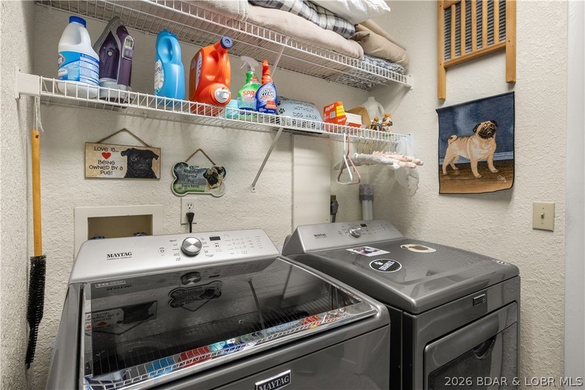Discover this immaculate 2nd-tier ranch in Linn Creek, boasting - photo 11