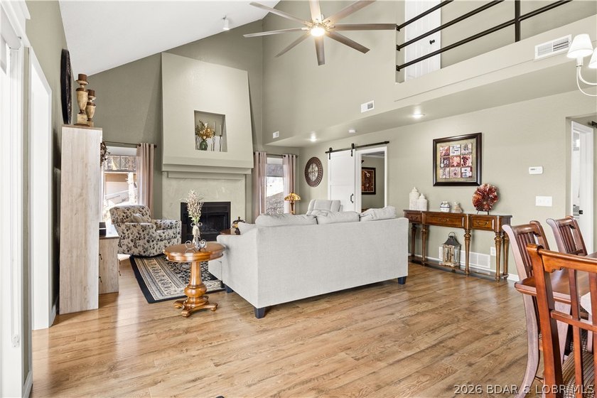 Discover this immaculate 2nd-tier ranch in Linn Creek, boasting - photo 12
