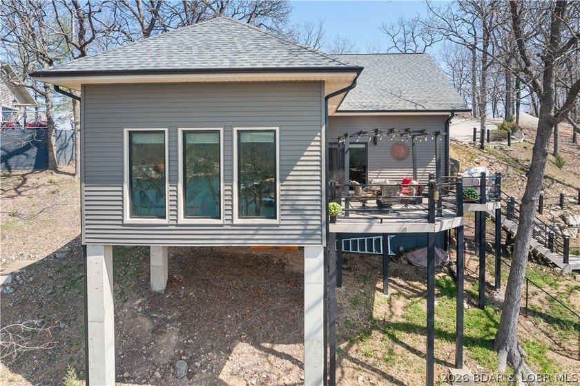 Discover this immaculate 2nd-tier ranch in Linn Creek, boasting - photo 38