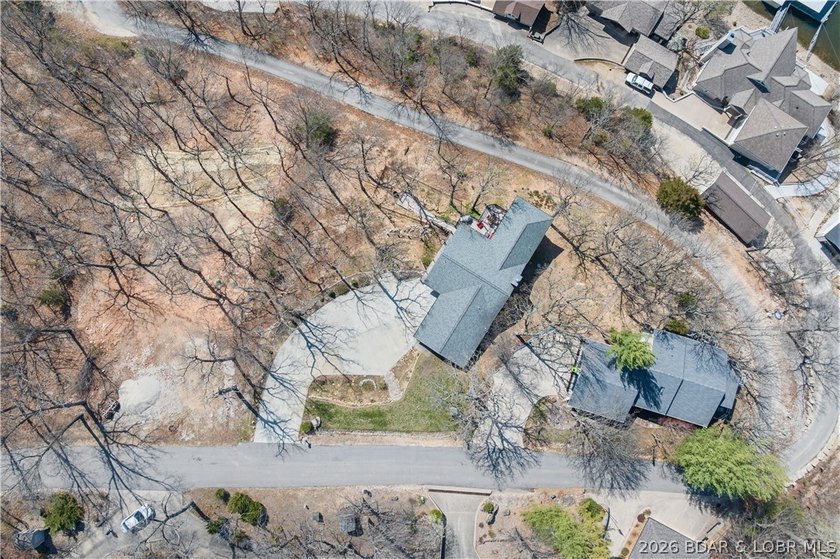 Discover this immaculate 2nd-tier ranch in Linn Creek, boasting - photo 42