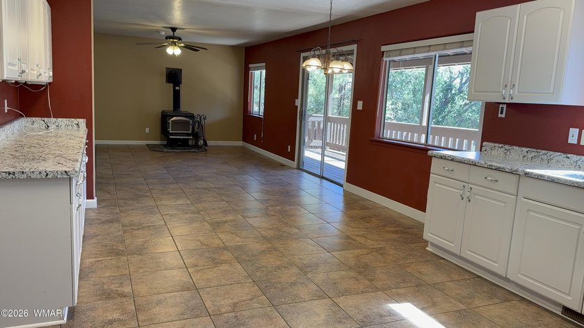 Welcome to this spacious 4-bedroom, 3-bath home in the desirable - photo 9