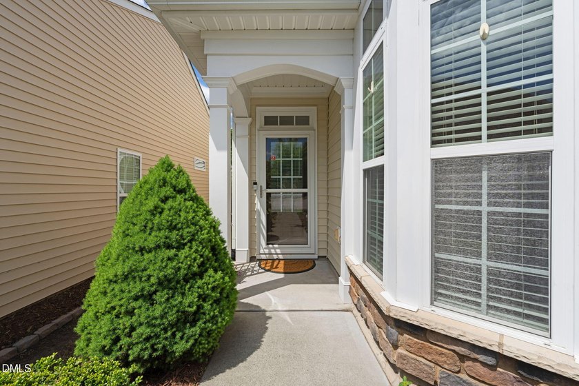 Located in Cary's premier 55+ active adult community, you can - photo 3