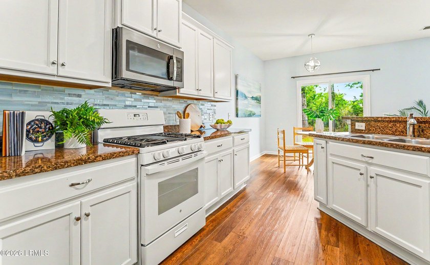 Welcome to this inviting 3-bedroom, 2.5-bath home nestled in the - photo 23