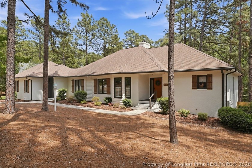 Exceptional home nestled on over one acre within the exclusive - photo 2
