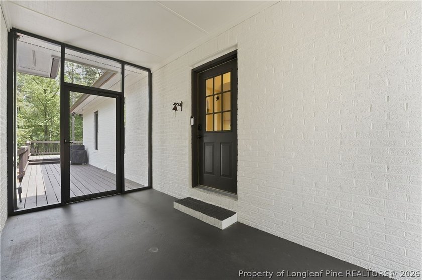 Exceptional home nestled on over one acre within the exclusive - photo 4