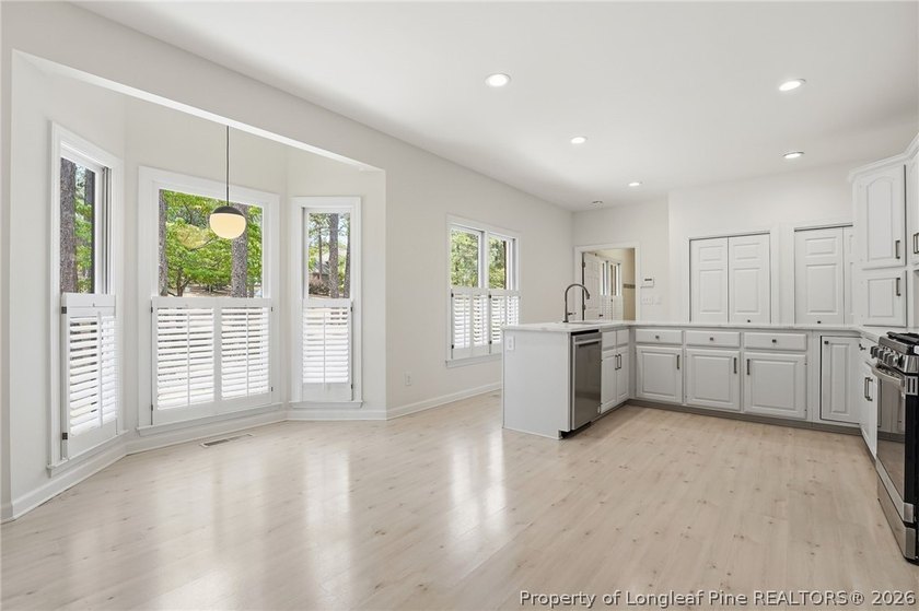 Exceptional home nestled on over one acre within the exclusive - photo 7