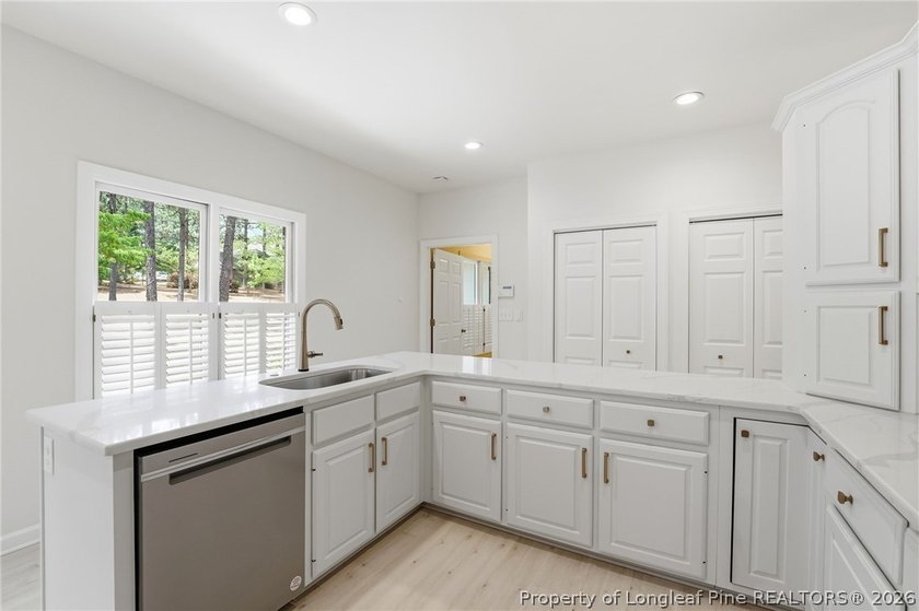 Exceptional home nestled on over one acre within the exclusive - photo 9
