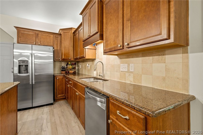 Welcome to the gated community of Carolina Trace! With over 2 - photo 13