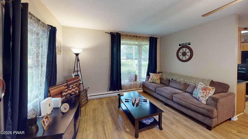 Nestled near Peck's Pond, this 2 bedroom ranch home sits on .6 - photo 5