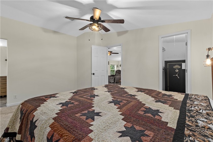 Tucked away on a beautiful wooded 1-acre waterfront lot in the - photo 18