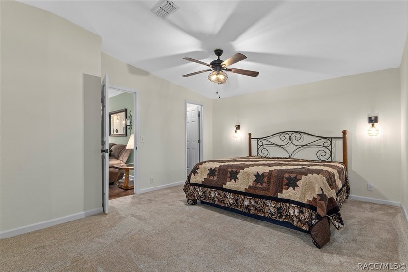 Tucked away on a beautiful wooded 1-acre waterfront lot in the - photo 22
