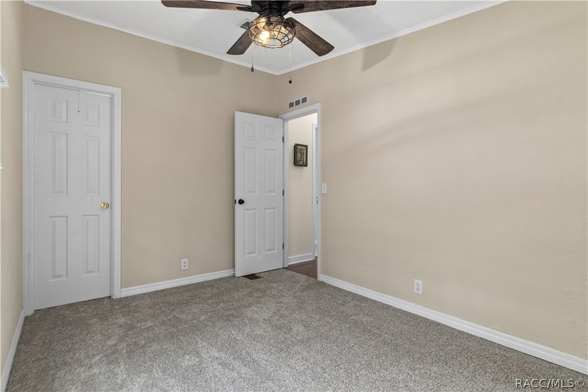 Tucked away on a beautiful wooded 1-acre waterfront lot in the - photo 24