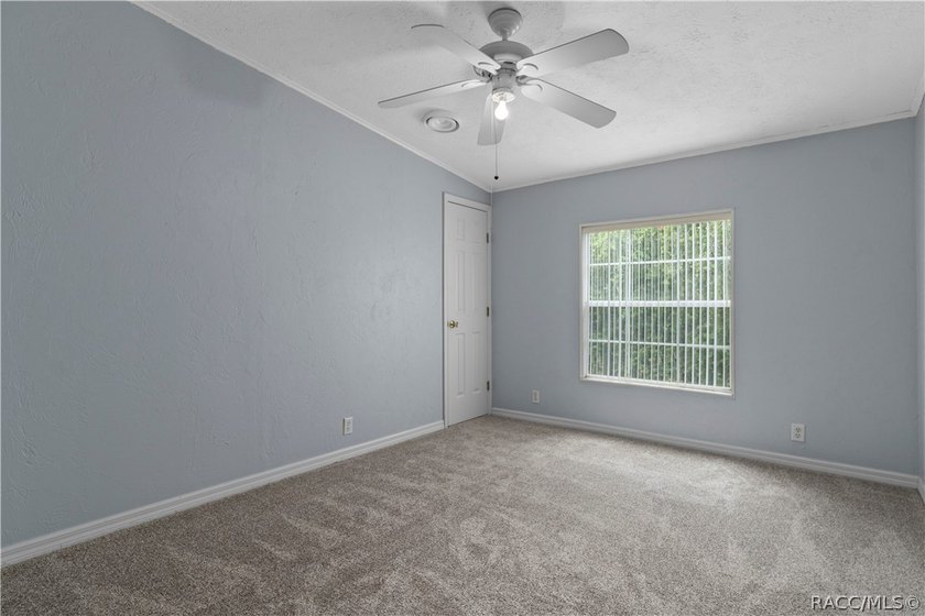 Tucked away on a beautiful wooded 1-acre waterfront lot in the - photo 25