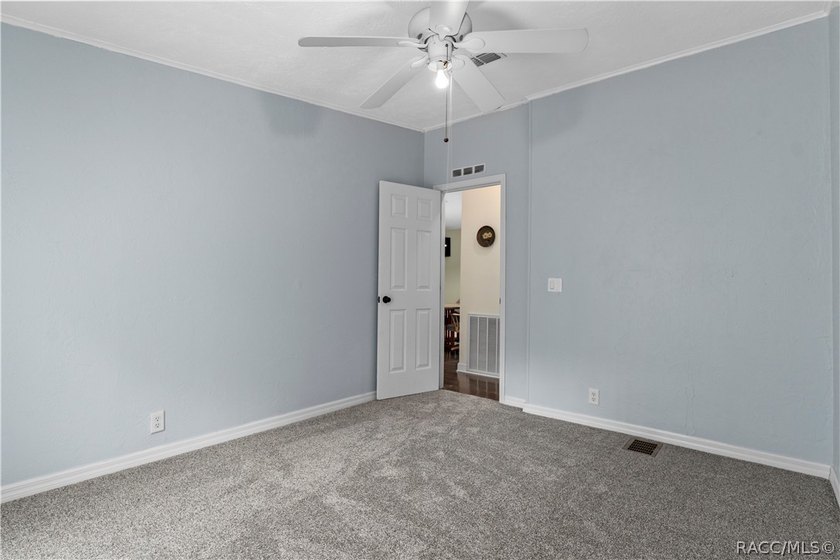Tucked away on a beautiful wooded 1-acre waterfront lot in the - photo 26