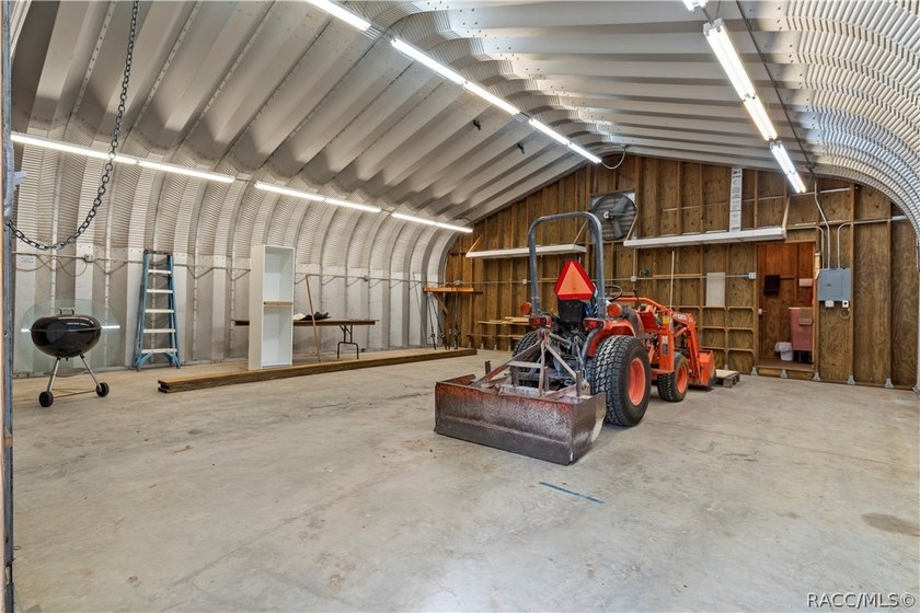 Tucked away on a beautiful wooded 1-acre waterfront lot in the - photo 34