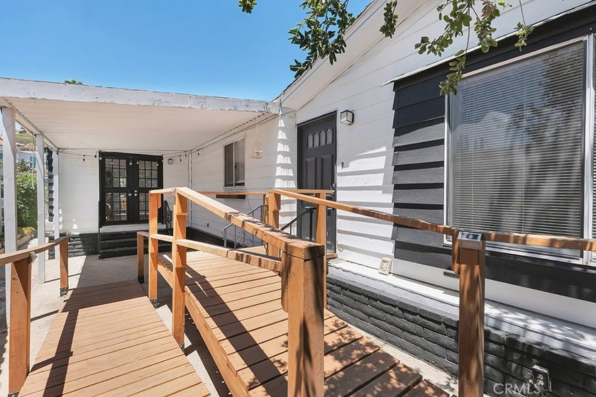 Welcome to this beautifully maintained 4-bedroom, 2-bathroom - photo 2