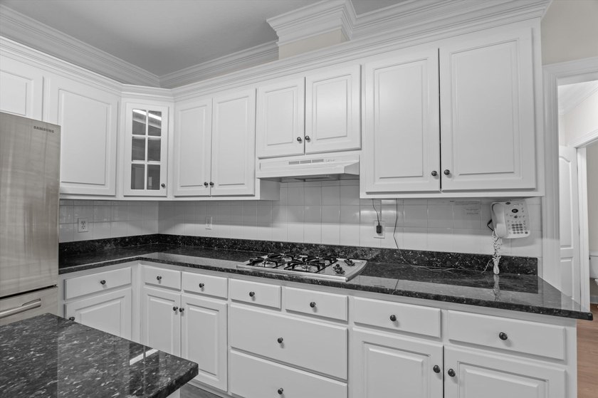 Welcome to this stunning 5-bedroom, 4.5-bath home located in the - photo 19