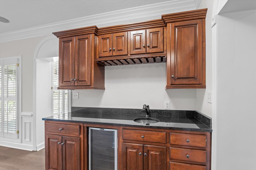 Welcome to this stunning 5-bedroom, 4.5-bath home located in the - photo 22