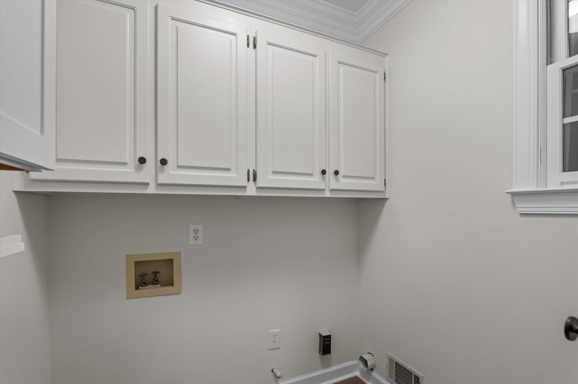 Welcome to this stunning 5-bedroom, 4.5-bath home located in the - photo 28