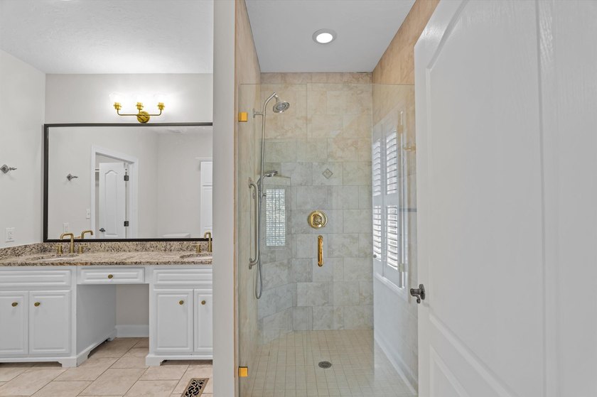 Welcome to this stunning 5-bedroom, 4.5-bath home located in the - photo 32