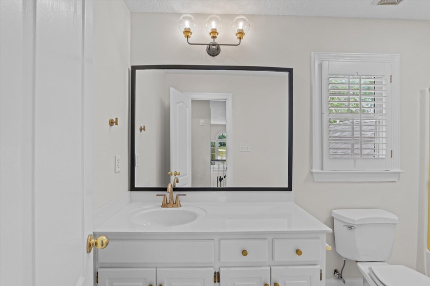 Welcome to this stunning 5-bedroom, 4.5-bath home located in the - photo 43