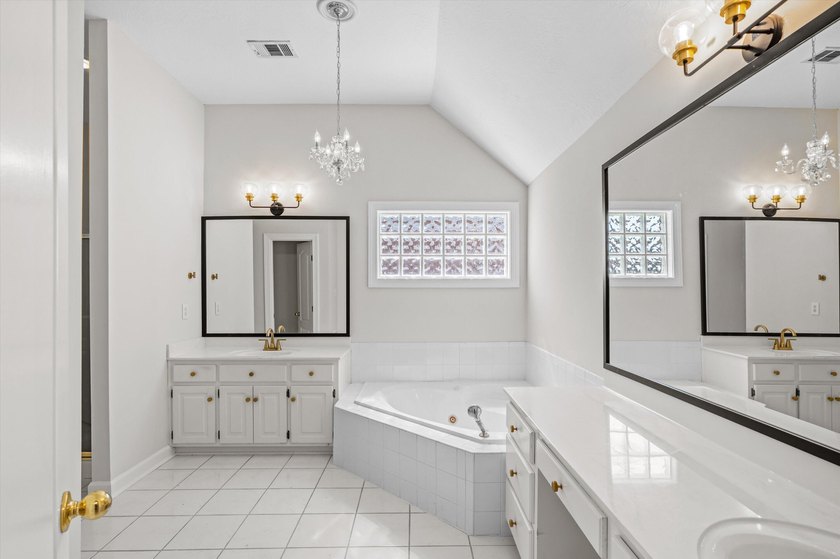 Welcome to this stunning 5-bedroom, 4.5-bath home located in the - photo 54