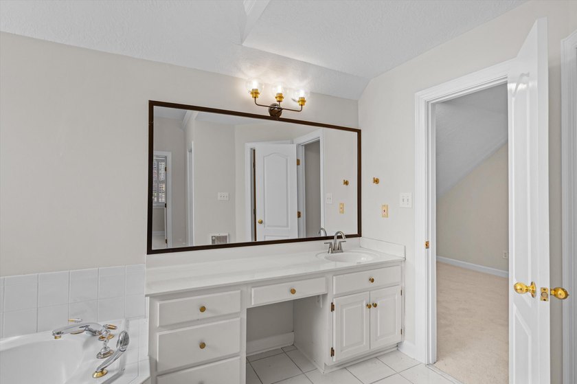 Welcome to this stunning 5-bedroom, 4.5-bath home located in the - photo 55