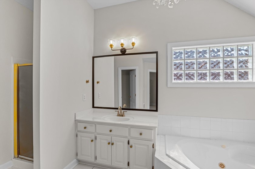 Welcome to this stunning 5-bedroom, 4.5-bath home located in the - photo 56