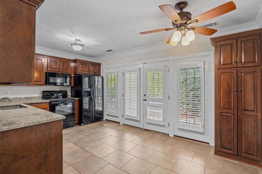 Welcome to this stunning 5-bedroom, 4.5-bath home located in the - photo 60