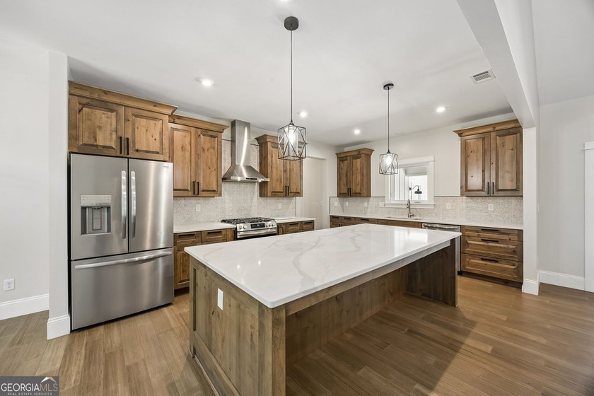 This custom-built home is situated on approximately 3 acres and - photo 4