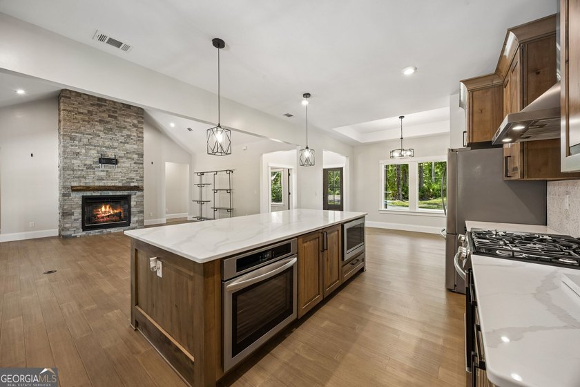 This custom-built home is situated on approximately 3 acres and - photo 5